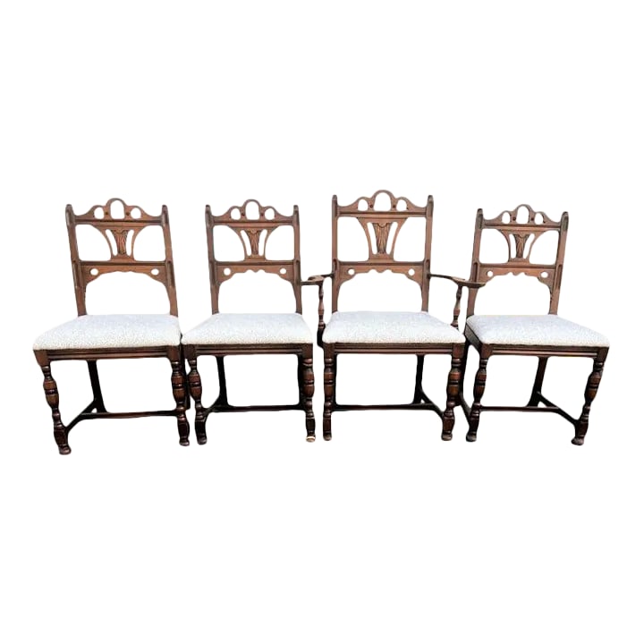 Antique Spanish Revival Solid Walnut Dining Chairs With New Kravet Upholstery - Set of 4 - Early 20t: New seat upholstery of luxurious textured Kravet fabric on a set of classic solid walnut 1920s era Spanish Revival dining chairs. From one of the greatest furniture businesses of the era, Lammert's