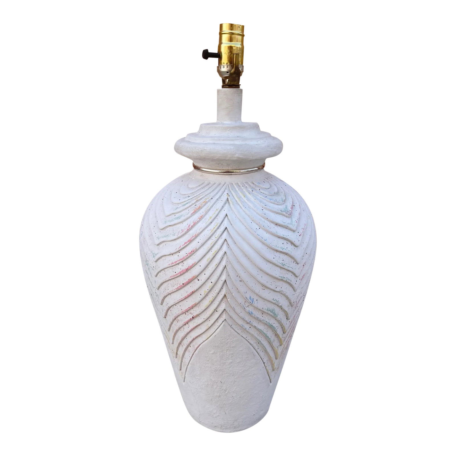 Vintage Postmodern Plaster Table Lamp: Beautiful Postmodern Plaster Table Lamp with hints of pastel pink, green and blues throughout. Brass ring at neck. Carved pattern all around. 24in h x 11in x 11in Condition: Alterations: Original