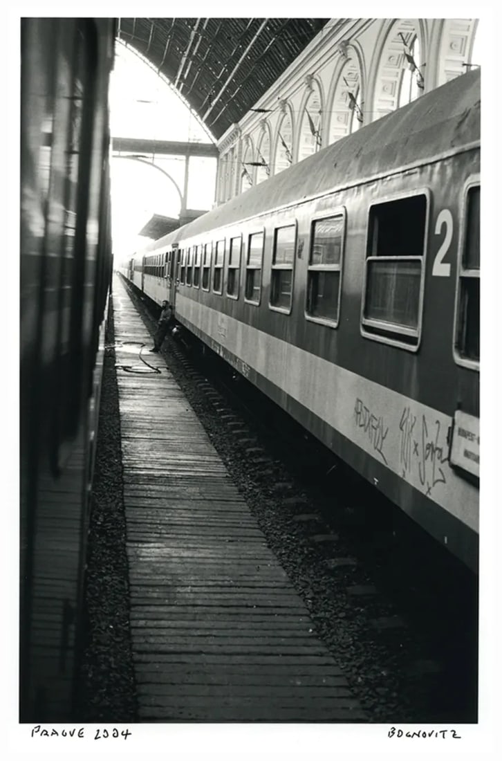Prague "Train", 2004, Silver Gelatin Photograph, Murray Bognovitz: Murray Bognovitz Prague "Train", 2004 Dimensions: 5.75"x9" on 11x14 paper Medium: Selenium toned SG, Fiber glossy paper Edition: Open Signed and titled recto Condition: Mint Condition: Imperfections: 