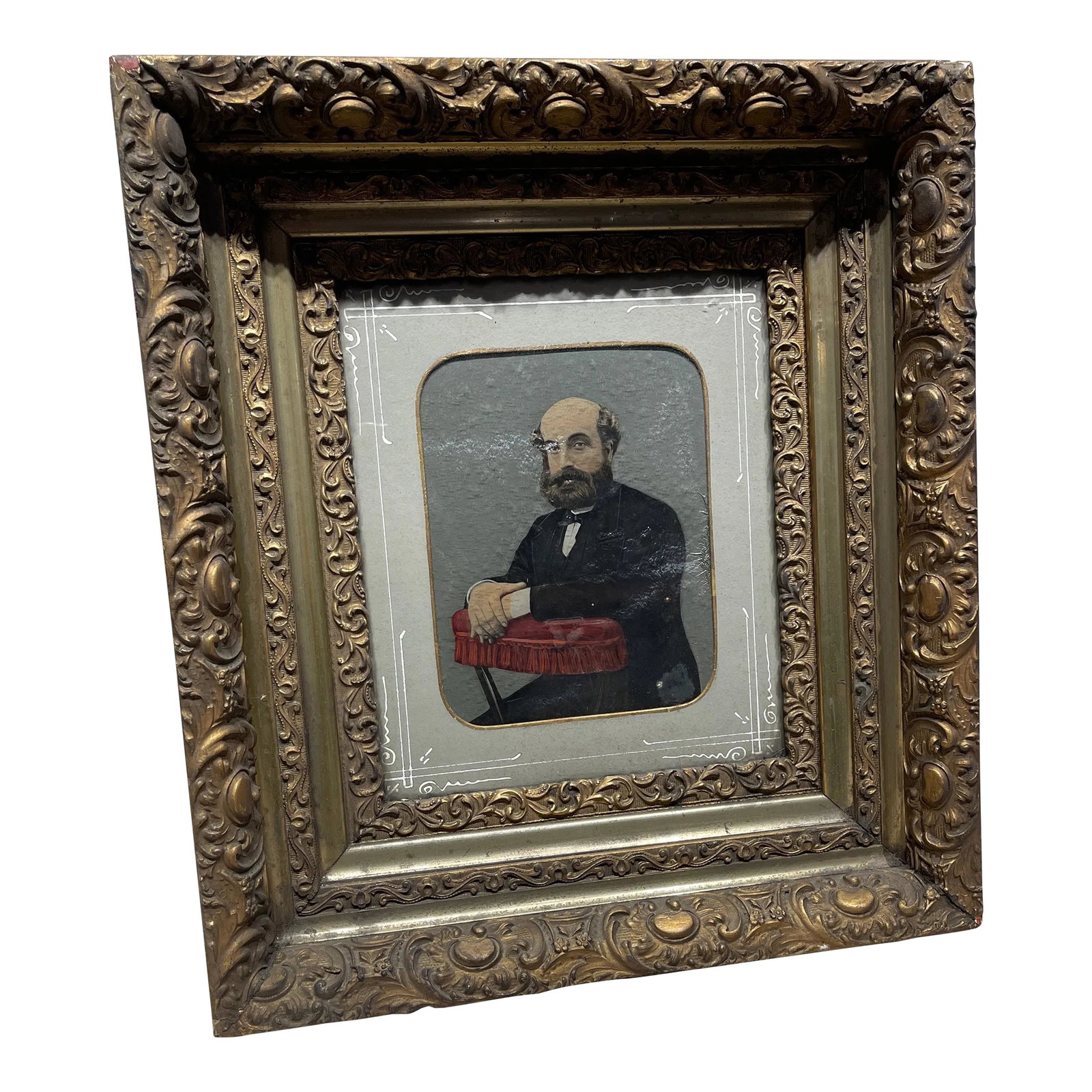 Mid 19th Century Hand Painted Photographic Portrait of a Dignitary Gentleman: Hand Painted Photographic Image of a dignified gentleman from a studio portrait with his hands resting on a red fringed cock fighting chair. A Mid 19th Century English Man with beard dressed in black