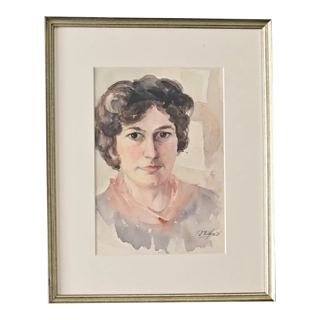 French Vintage Framed Watercolor Portrait of a Lady: A French vintage watercolor on paper portrait of a lady (of uncertain age) whose arresting stare drawers the viewer in to the pastel-hued composition. Small signature by the artist to the lower right.