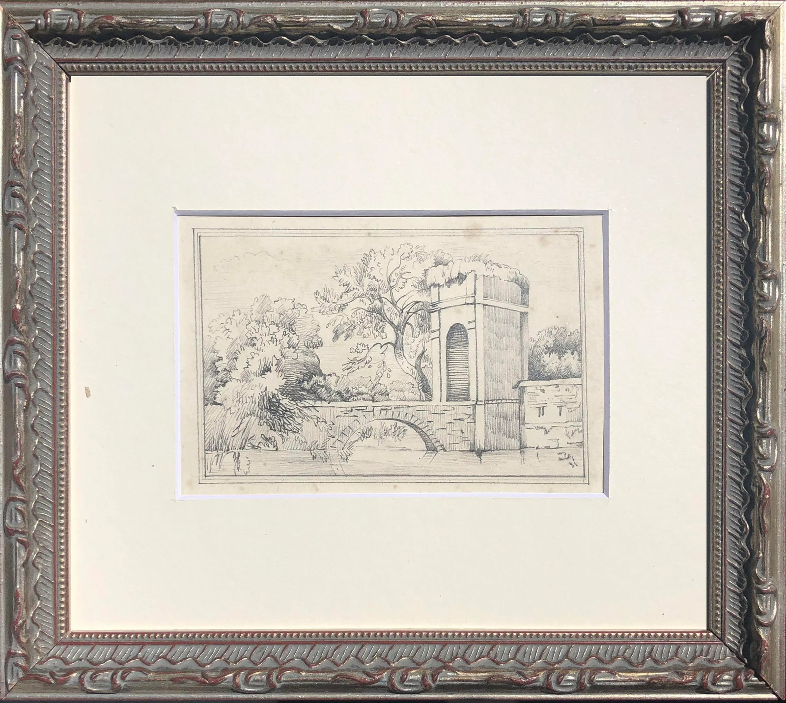 19th Century Antique Italian Graphite Landscape Drawing 1831: 19th Century, finely detailed graphite landscape drawing with a beige over a river. Location and date "Italy (18)31" lower right. Presented in light cream colored matting and a silver gilt wood frame 