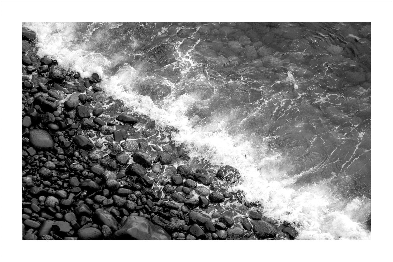 "British Pebble Beach" Contemporary Coastal Black and White Giclee Print: This is an exclusive limited edition black and white Giclee print, on 100% cotton Hahnemuhle Photo Rag Fine Art matte paper. This gorgeous black and white high contrast photograph portraits the