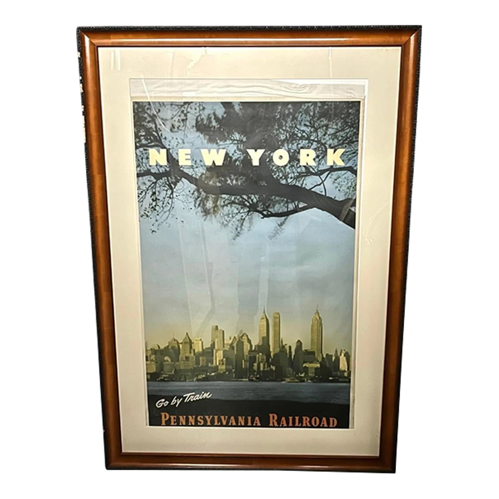 New York Go by Train Pennsylvania Railroad 1949 Large Framed Travel Poster: Measures approx: In frame: 51" x 35" Print size: 38" x 24" Looks to be in great condition. Top left corner of the frames wood is peeling. May show reflections on the glass due to lighting conditions.