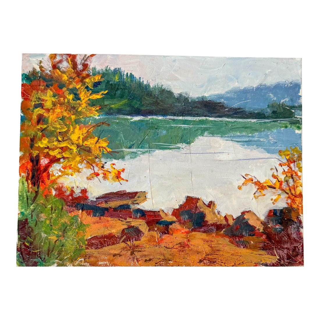 Vintage Autumnal Lakeside Landscape Painting, 9x12: Lovely warm colors, textured paint and brushstrokes depicting an autumn lakeside scene with serene reflections in the water. On canvas board. Unsigned Measures: 9" x 12" Condition: Alterations: