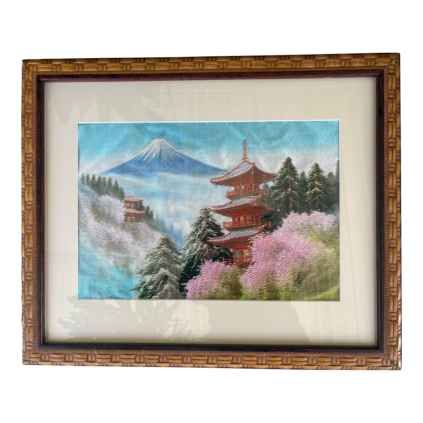 Vintage Japanese Silk Embroidery of Mount Fuji With Pagodas, Framed: This vintage Japanese silk embroidery features a serene and iconic landscape depicting Mount Fuji rising above misty hills, framed by traditional pagodas, evergreen trees, and blooming cherry