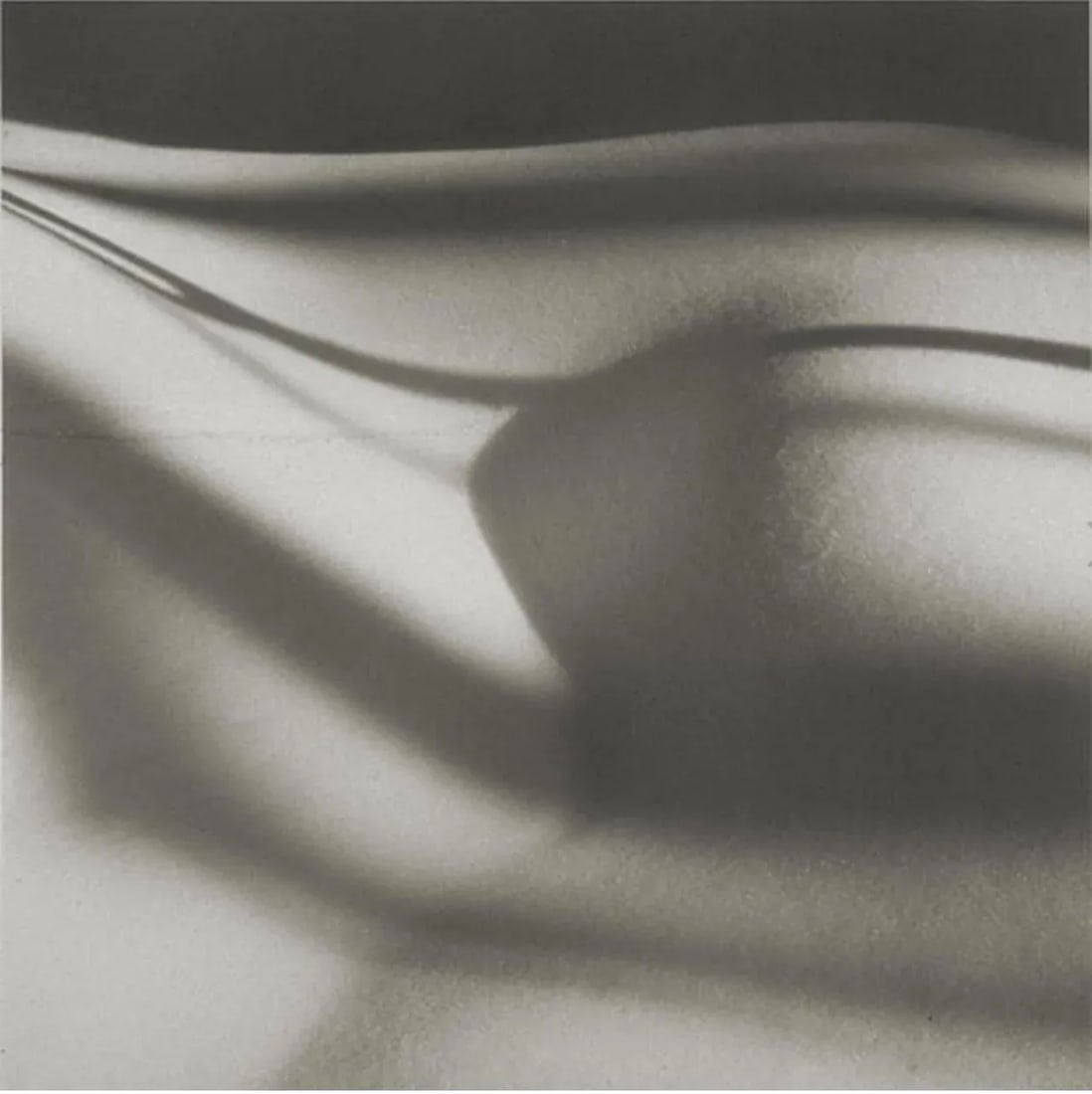 "Snow Shadows" Black and White Silver Gelatin Photograph by Joe Jurson: black & white silver gelatin photograph, Edition. 11/25 Image size: 5 x 5 in (12.7 x 12.7 cm) Matted Size: 14 x 11 in (35.56 x 27.94 cm) matted with 100% rag mat and protected by transparent