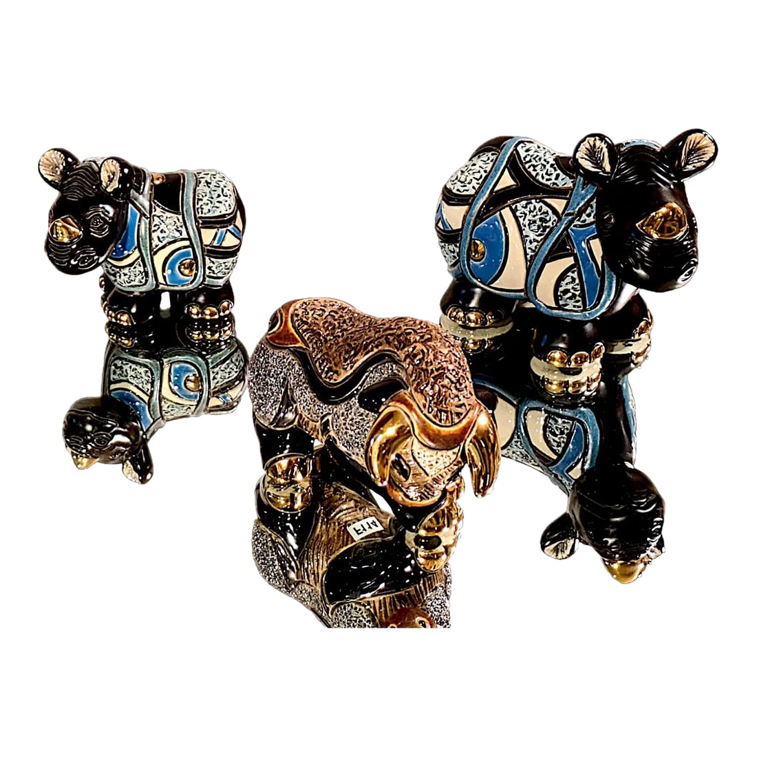 Trio Lot of of DeRosa Rinconada Collectible by Hand Sculptures From Uruguay 2007 -2014: Offering a 3 pc. lot of collectible DeRosa Rinconada figurines from the "Family Collections". These are hand crafted from Uruguay, circa 2007 - 2014 They include: a golden brown silver and gold bull "