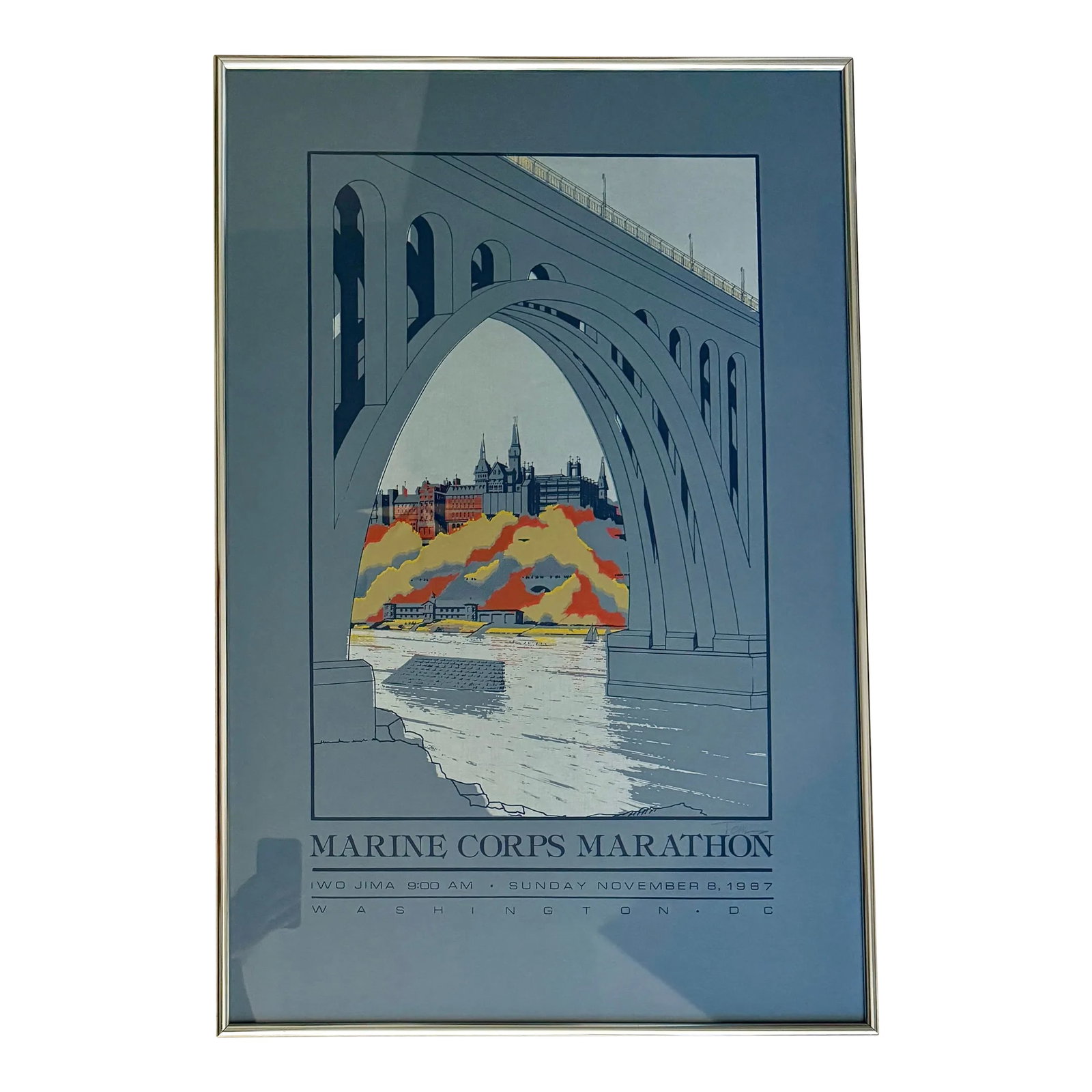 1987 Original Framed Marine Corps Marathon Commemorative Poster: Rare, original 1987 commemorative poster from the Marine Corps Marathon in Washington, DC. The men's course record was set in 1987 and still holds. Shades of blue are accented with orange, yellow and 