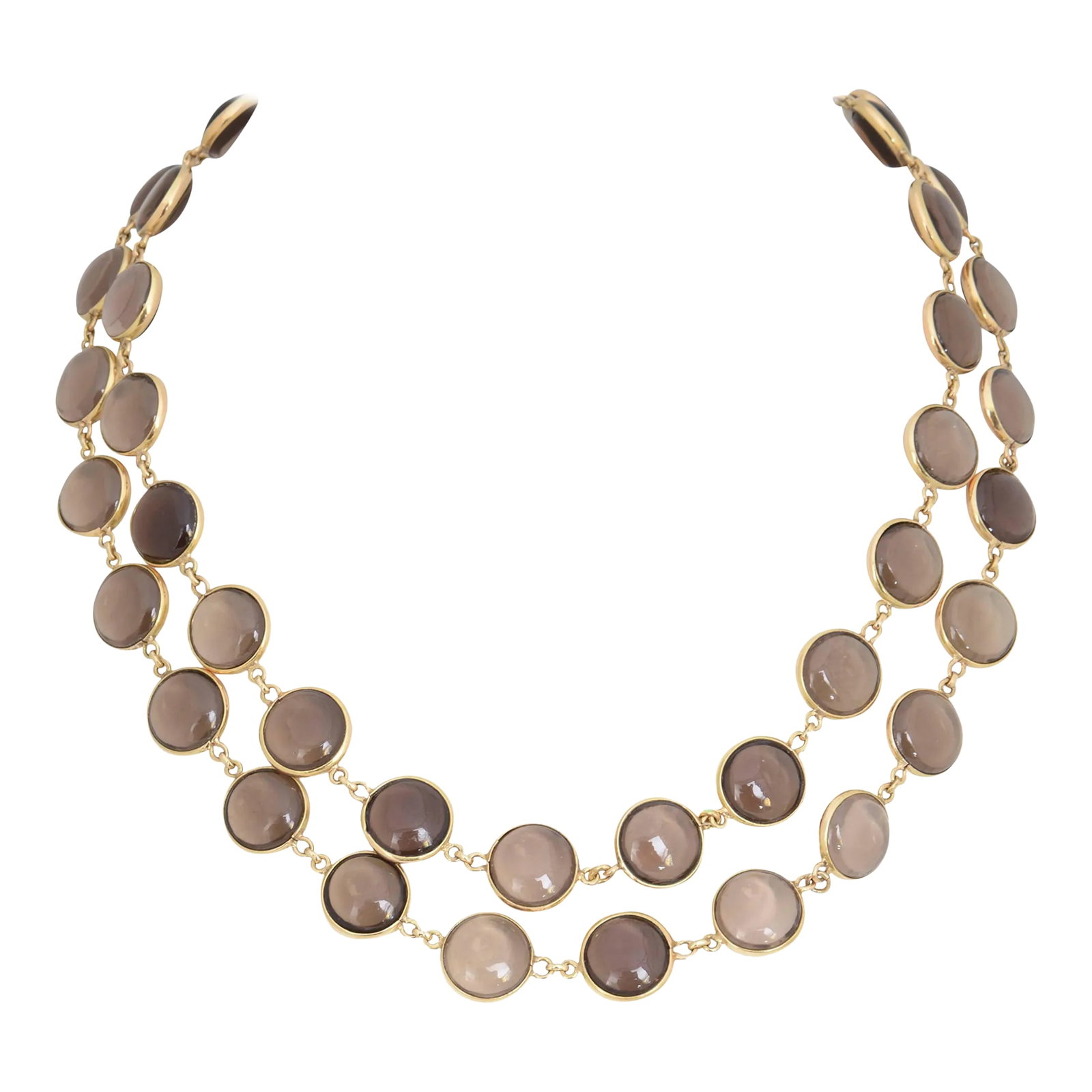 Smoky Topaz 18k Gold Necklace: 33" of Smoky topaz bezel set in 18k yellow gold with 18k chain between. The necklace does not have a clasp. It goes over your head, although a clasp can be added for $200 more. Please see the
