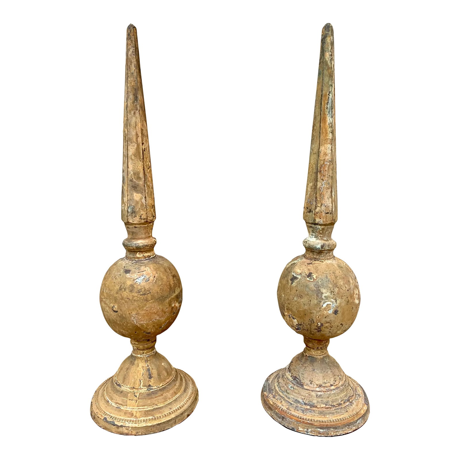Weathered Cast Iron Garden Finials, a Decorative Pair: A striking pair of weathered cast iron garden finials with a beautifully aged surface and timeless architectural presence. Their classic urn-form bases and elongated spear-shaped silhouettes make
