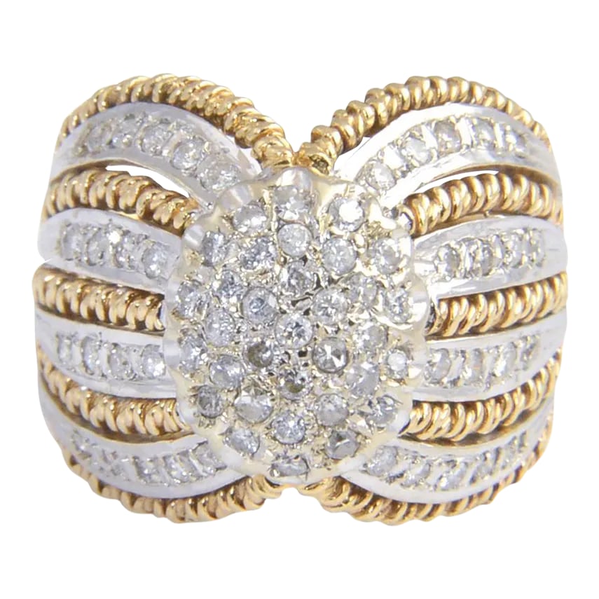 1970s Diamond White and Twisted Yellow Gold Dome Ring size 6.25: 1970s 14K gold dome ring with diamonds set in white gold accented by yellow gold twisted edges. There is approximately 1 carat of diamonds in the ring. Size: 6 1/4. Slight scratches on the band.
