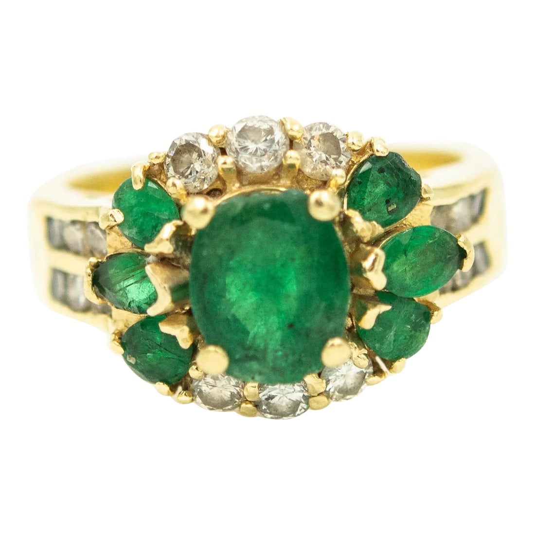 Emerald and Diamond Yellow Gold Ring size 8: Emerald and diamond 18k yellow gold ring with a contemporary band that has 6 round channel set diamonds on either side. The ring contains a center 4 prong set oval green emerald that weights