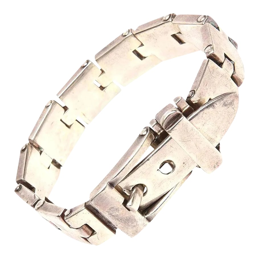 Vintage Sterling Silver Buckle Bracelet: This is part of Chairish's Costume Jewelry assortment. This beautifully made and substantial signed hallmarked sterling silver buckle bracelet fits many sizes. On the third hole it fits a small wrist