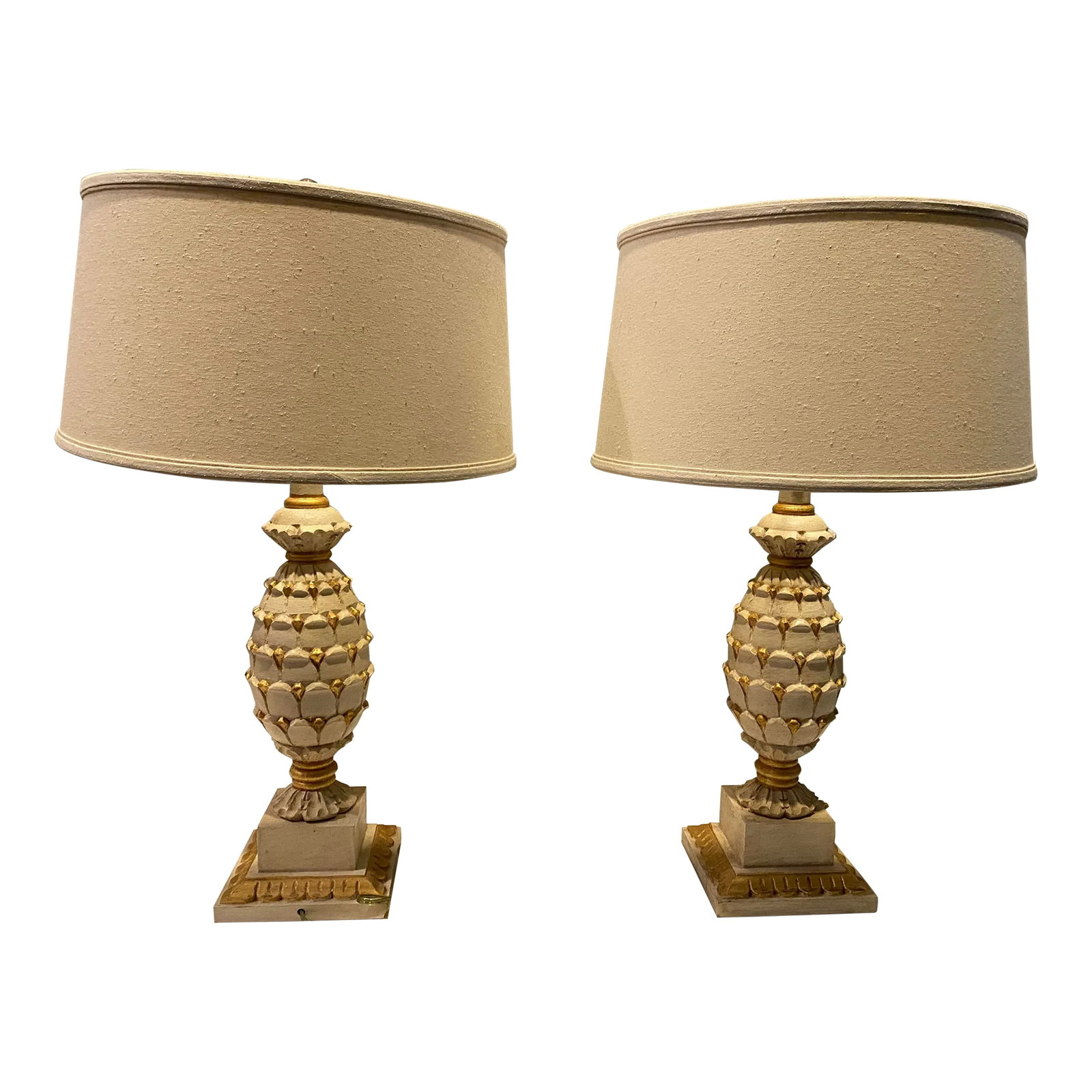 1970s Baker Furniture Pineapple Lamp, Made in Italy - a Pair: Classic Baker Pineapple Table Lamp. These wood beauties were made in Italy, painted a creamy white with gild detail. The shades are cream as well and have a bit of texture to them. Lamps, without the