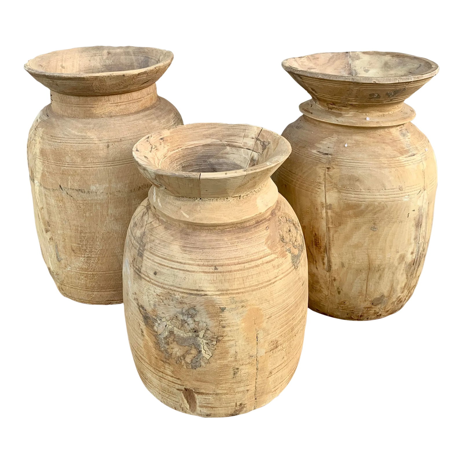 Set of 3 Antique Hand-Turned Bleached Wood Vessels: A striking set of three antique hand-turned wooden vessels with a beautifully bleached, raw surface and quiet sculptural presence. Each piece shows the subtle irregularities of hand craftsmanship,