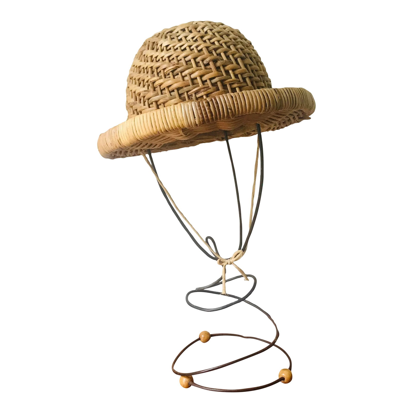 Antique Edwardian or Victorian Wicker Hat and Wire Stand: This amazing old wicker hat is a rare beauty featuring sturdy rattan, a strip of fabric to adjust the sizing, and a darling little bow strap. The stand is not original to the hat but we love the charm