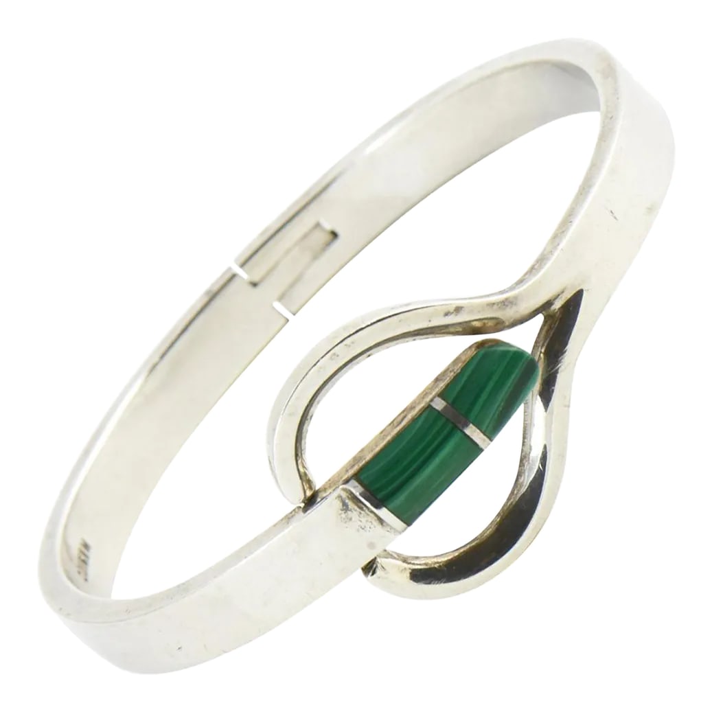Modernist Malachite Sterling Silver Bangle Bracelet: Vintage solid sterling silver bangle with malachite inlay from Taxco, Mexico. Interior, 6.5" circumference. Marked: TM-28 925 Mexico. Please see the measurements noted above in the description for bes