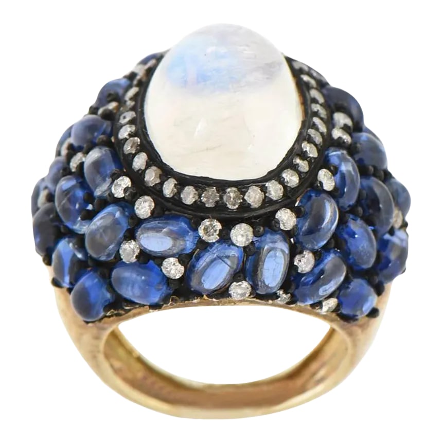 Moonstone, Kyanite and Diamond Cocktail Ring Size 7.25: This is part of Chairish's Fine Jewelry assortment. Impressive cocktail ring featuring a centrally set cabochon moonstone with a diamond frame inside a freeform collection of kyanite and diamond