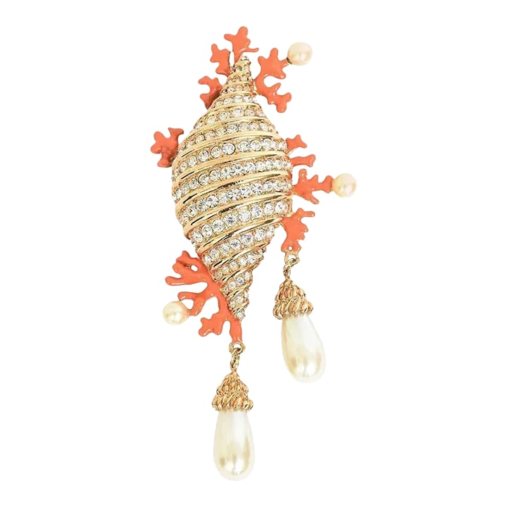 Hutton Wilkinson Coral Enamel Faux Pearl, Rhinestone Gold Filled Brooch /Pin 1980's: This is part of Chairish's Costume Jewelry assortment. This stunning signed and hallmarked Hutton Wilkinson pin and or brooch is a seashell of the gorgeous combination of coral enamel faux pearl, gold