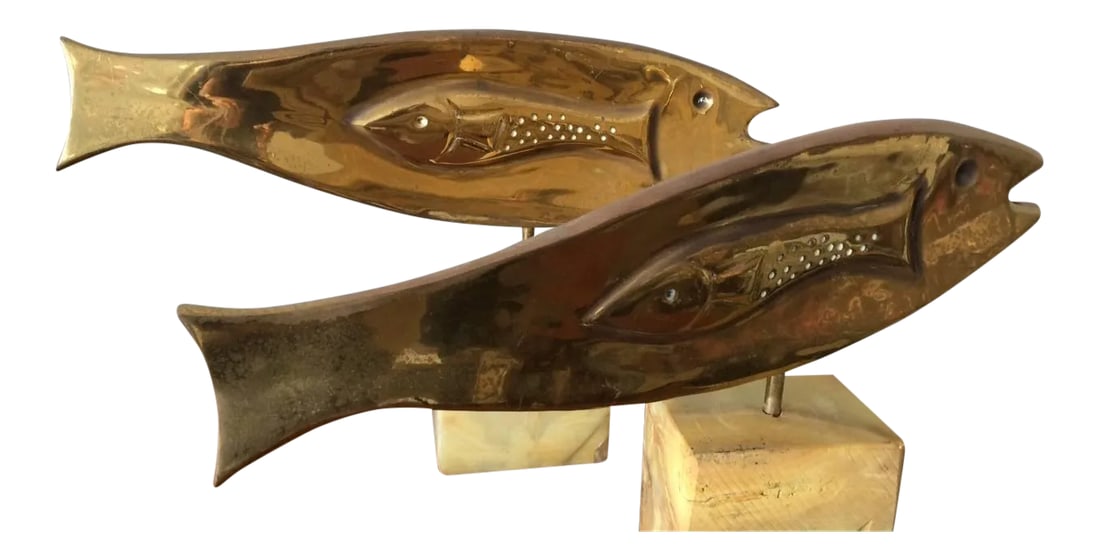 Brass Fish Sculptures by Curtis Jere - A Pair: A pair of unusual fish sculptures by C. Jere, 1981. Polished brass, alabaster bases. Each measures approximately 19" L. and pivots 360 degrees. Condition: Alterations: Original Condition Unaltered