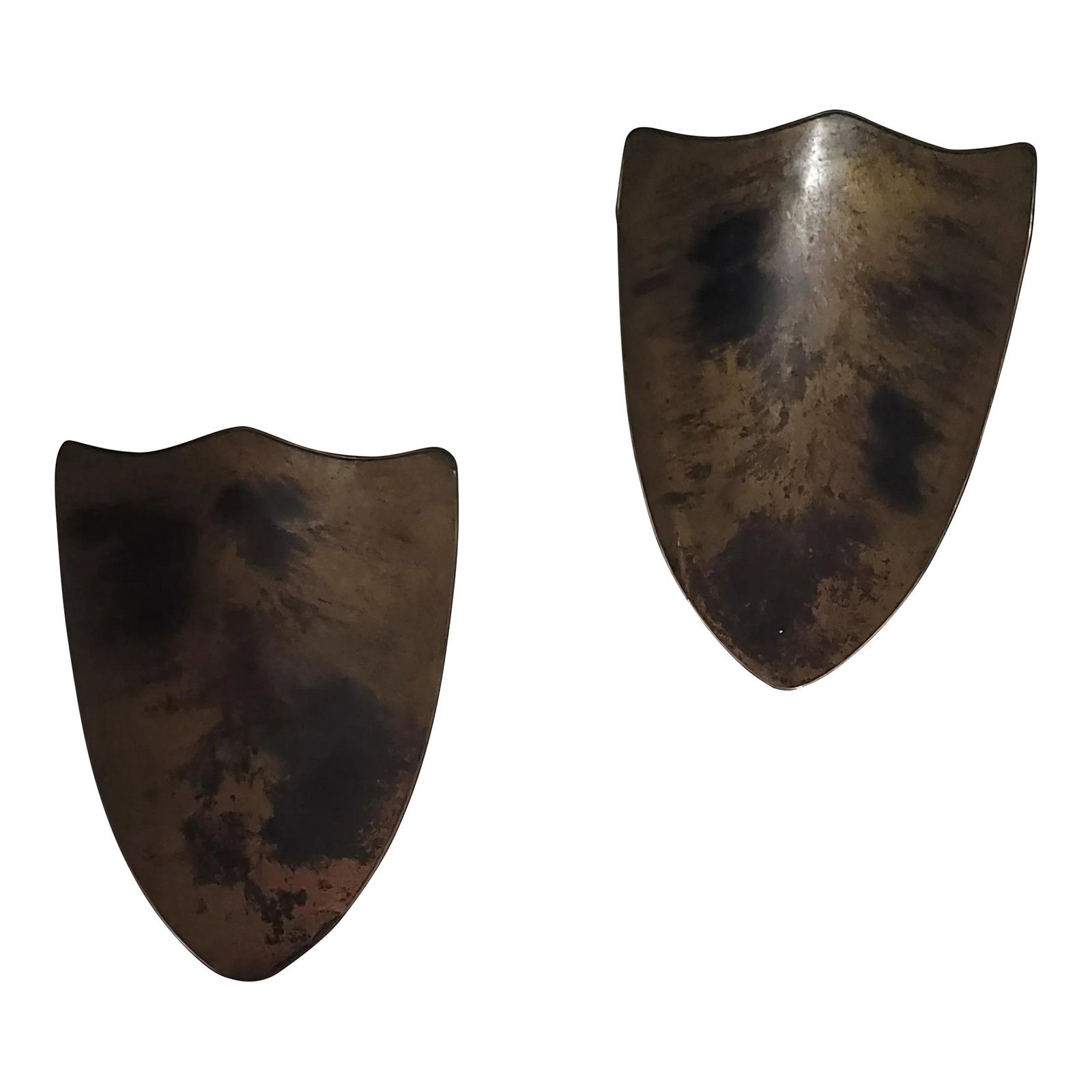 Pair of Antique Shield Wall Sconces: Spanish style shields found in South Texas were upcycled to maintain their original form, just with a different function. Originally priced at $2500 by the only boutique that has had them in