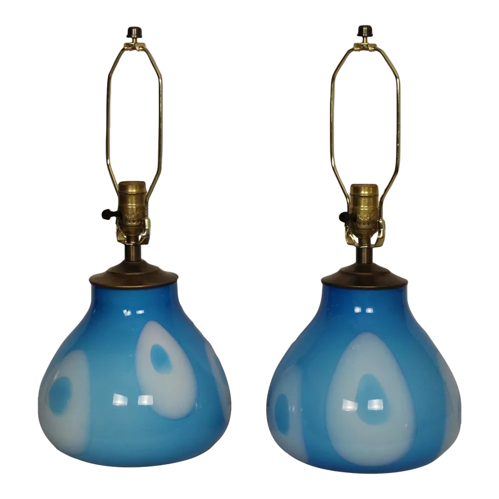 Mid 20th Century Mezza Influence Murano Lamps - a Pair: Beautiful pair of hand blown Murano. Vibrant sky blue mixed with white clouds inlay.. Low slung in scale. These pieces have a presence. Dimensions are 10.5 inches tall. 8 inches at widest point.