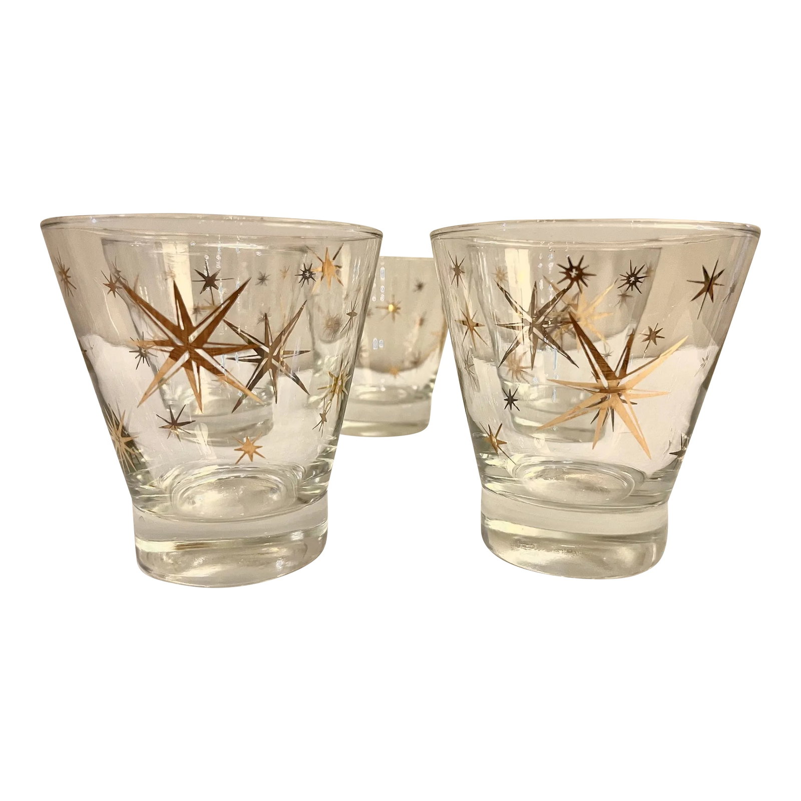 Vintage Atomic Starburst Barware Lowball Cocktail Glasses- Set of 5: Vintage cocktail/juice glasses made by Royal China. The popular Atomic starburst pattern is perfect for that retro bar. Gold stars show little to no wear. The glasses are 4" wide at the top and 4" tal