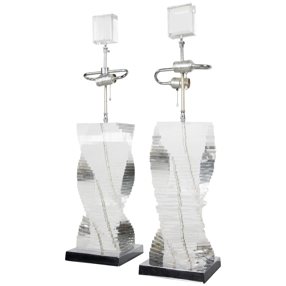 Stacked Lucite Helix Table Lamps - a Pair: Elegant two-light table lamps with thick stacked Lucite in helix form on chrome bases, with original large bevelled Lucite finials. Condition: Alterations: Unknown Imperfections: Some Imperfections Co