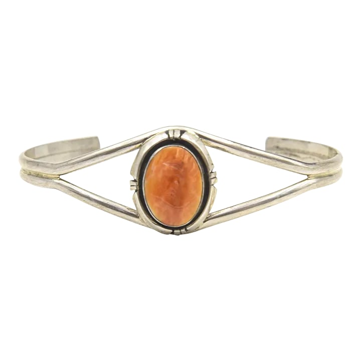 Late 20th Century Southwestern Native American Spiny Oyster Sterling Silver Cuff Bracelet: This is part of Chairish's Costume Jewelry assortment. Vintage Native American sterling silver cuff bracelet featuring an oval bezel set spiny oyster shell. Marked on the back sterling with an
