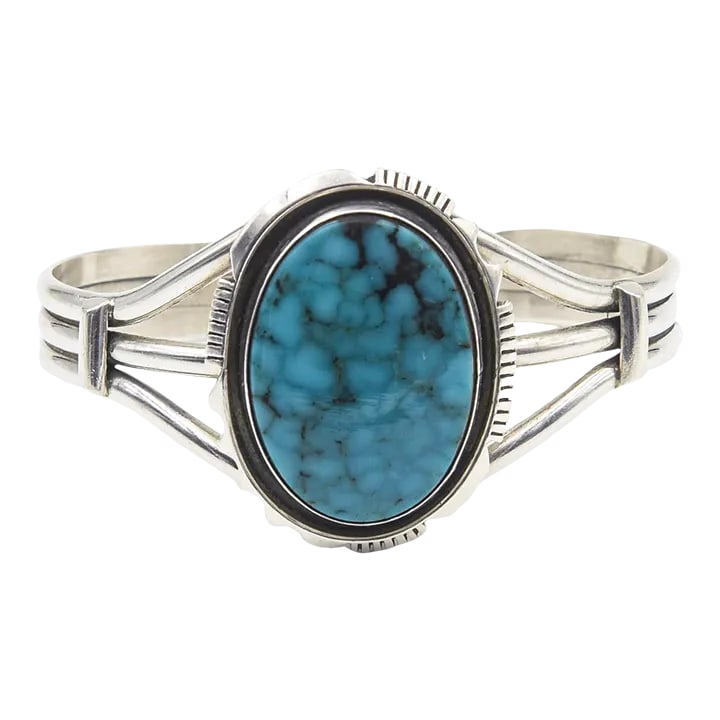 Late 20th Century Southwest Native American Turquoise Sterling Silver Cuff Bracelet: This is part of Chairish's Costume Jewelry assortment. Vintage Native American sterling silver cuff bracelet featuring an oval bezel set turquoise cabochon. Marked on the back sterling RR DIT. Interio