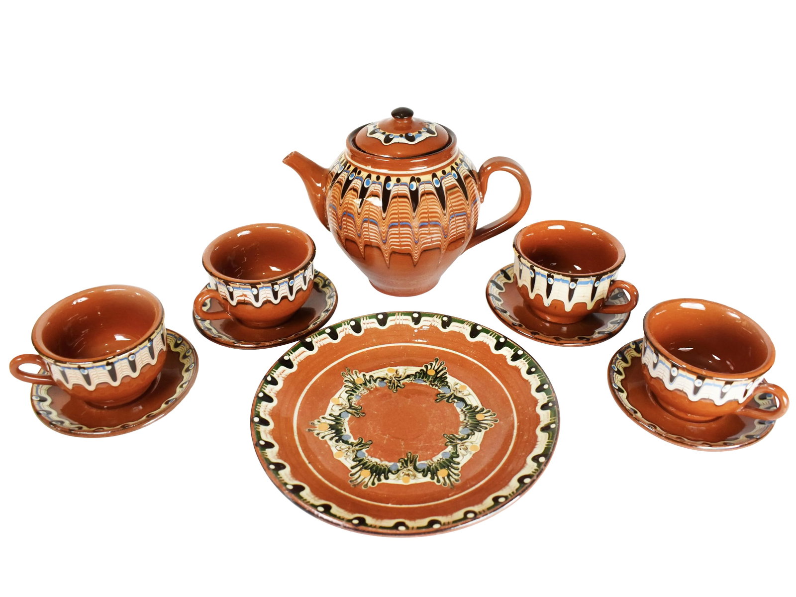 Vintage Handmade Hand Painted Soviet Bulgarian Red Clay Pottery Tea/Coffee Serving Set - 10 Pieces: Adorn your home in ethnic style with this Bulgarian Pottery Set with Hand-Painted Decoration. This tea or coffee set is handmade in Bulgaria. The set consists of 4 cups, 4 Saucers, a dessert plate (ca