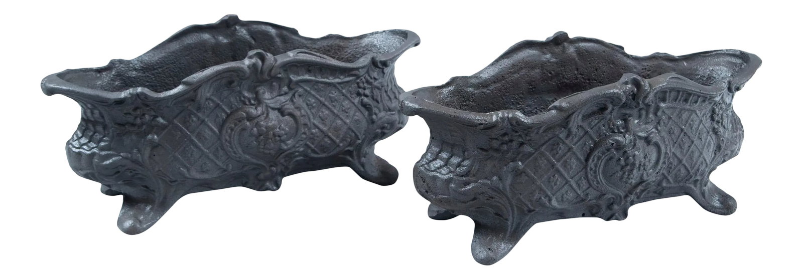 Pair of Cast Iron Footed Planters, Circa 1900: Pair of Cast Iron Footed Planters, France, circa 1900. Lovely oblong shape with scrolled top. Overall floral and trellis design. Condition: Alterations: Original Condition Unaltered Imperfections: