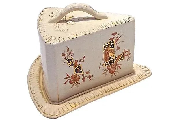 Antique Covered English Ceramic Cheese Dish: Antique covered English Staffordshire ceramic cheese dish with handle. Shaped like a large cheese wedge and hand-painted decoration of florals, leaves, and geometric banners in the ironstone style.