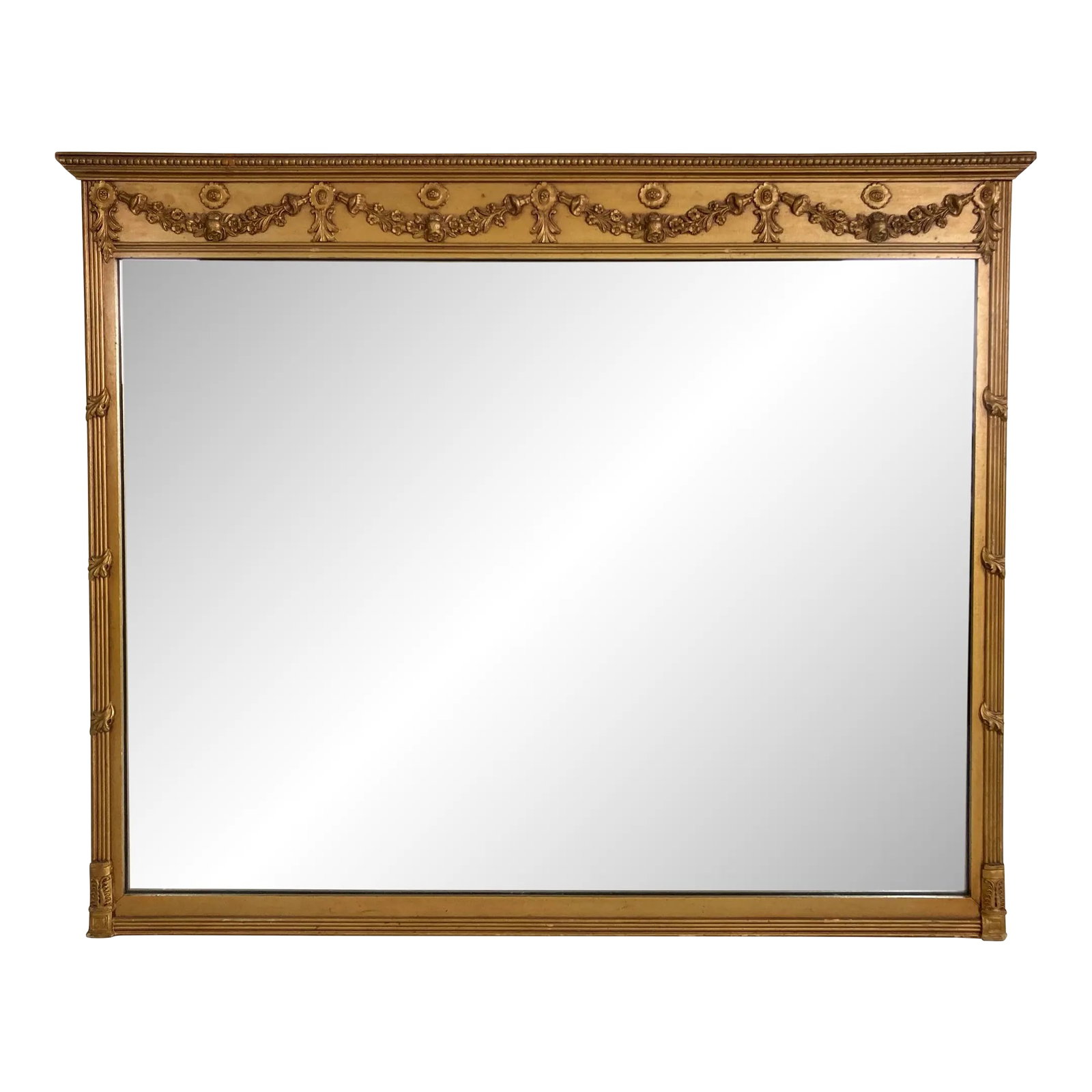 Vintage Art Nouveau Style Carved Gilt Wood Wall Mirror: Large antique Art Nouveau style carved gilt wood framed wall or mantle mirror. This piece has a quiet elegance with great presence. Gilt details to frame. It does not currently have hanging hardware, 