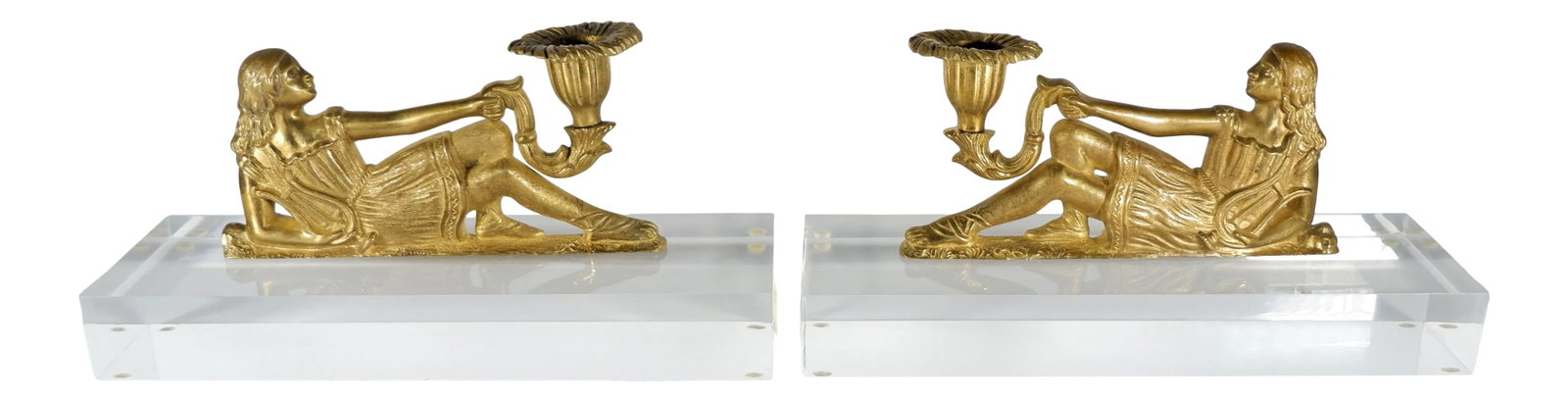 French Gold Gilt Candleholders of Reclining Women on Lucite Bases - a Pair: A pair of gold gilt French candle holders in the shape of a reclining woman. They have been modernized and attached to a thick Lucite base. Nice look of old and new. Measures: base 9" long, 3" wide