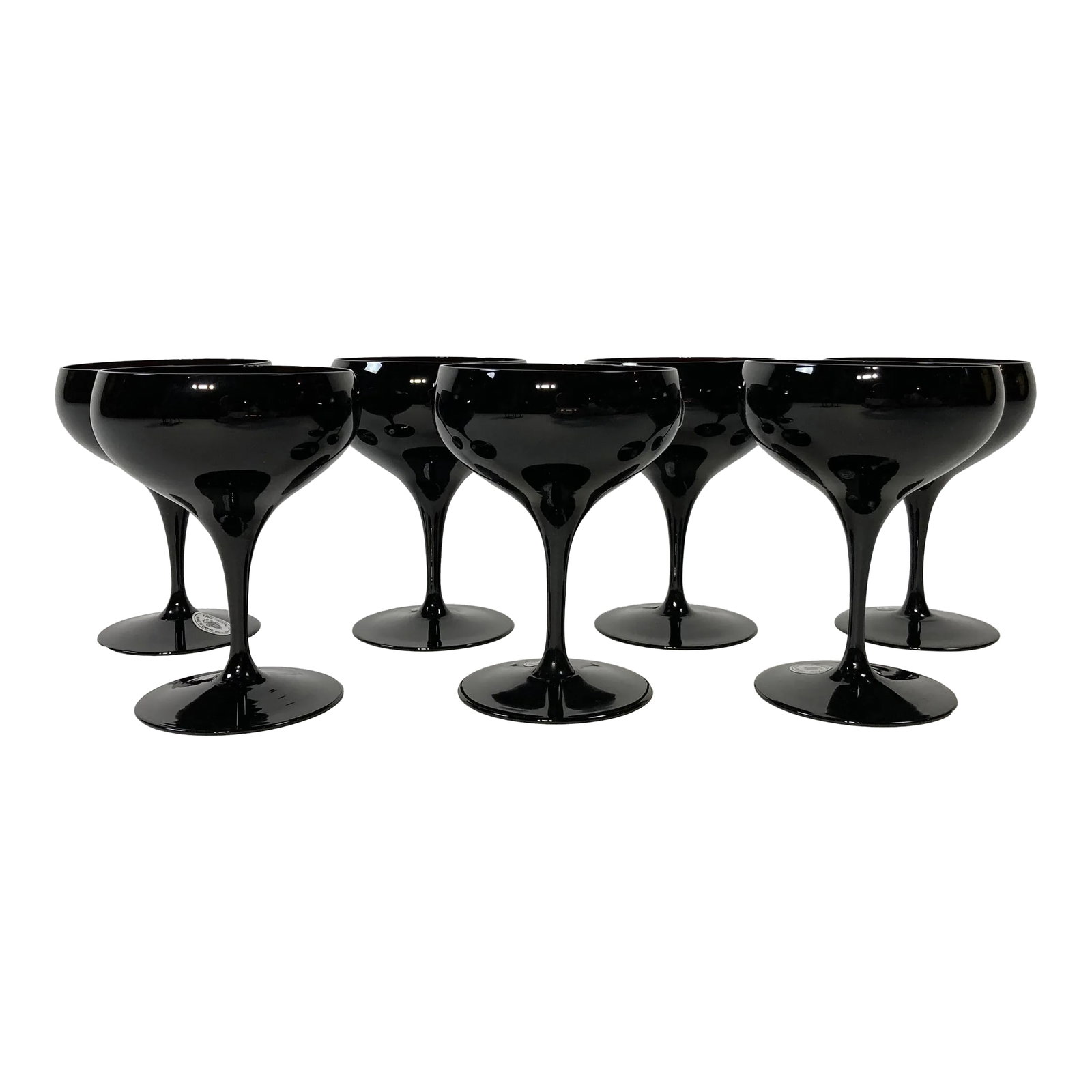 Vintage German Hand-Blown Black Crystal Goblets, Set of 7: Stunning set of seven hand-blown crystal stemmed goblets made in Germany. This gorgeous set is black at first glance, but has a very deep red tint to the glass. The color is truly extraordinary. All