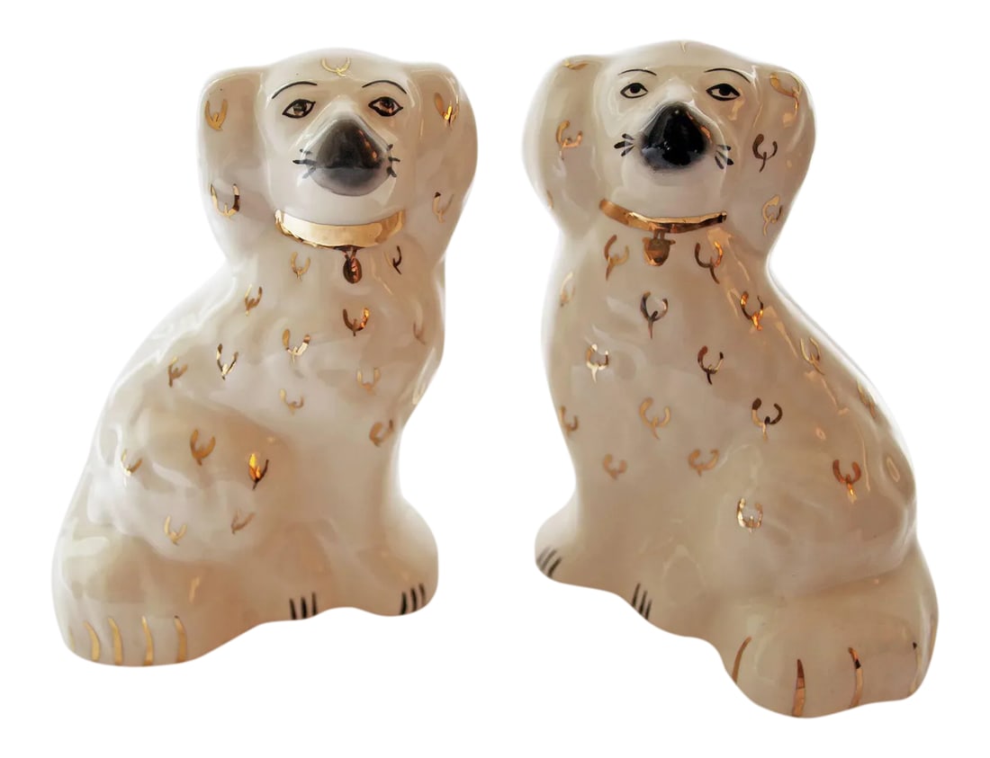 Vintage Staffordshire Style Dogs - A Pair: Pair of vintage Foo dogs. White glazed ceramic with black, red and gold accents. Condition: Alterations: Original Condition Unaltered Imperfections: Some Imperfections Condition Notes: Age