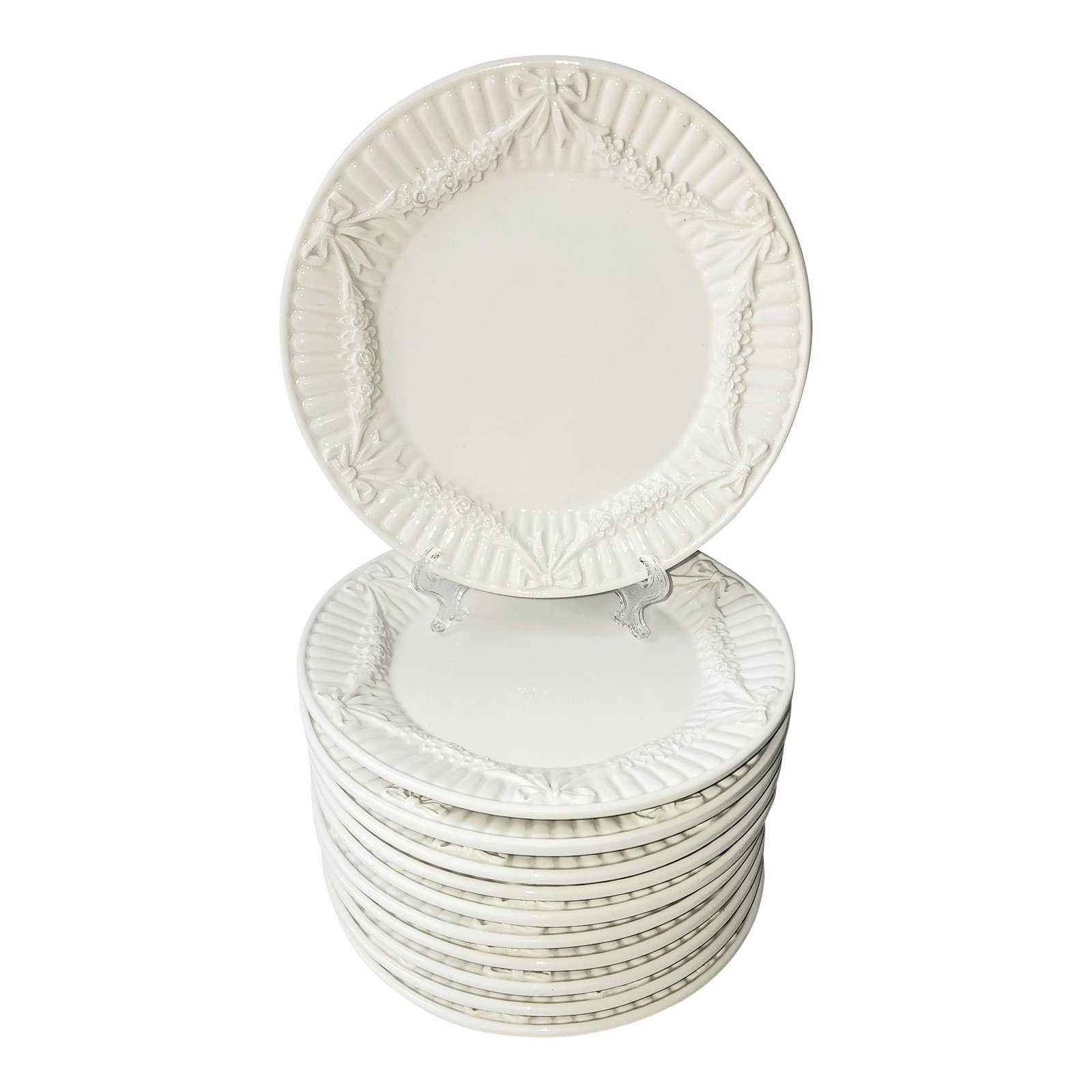 1990s Tiffany & Co. White Garland Dessert/Salad Plates - Set of 11: Enjoy a festive moment with Tiffany & Co. white garland dessert/salad plates. Features an embossed swag garland with tiny white flowers, highlighted with bows all around. Perfect for weddings or any