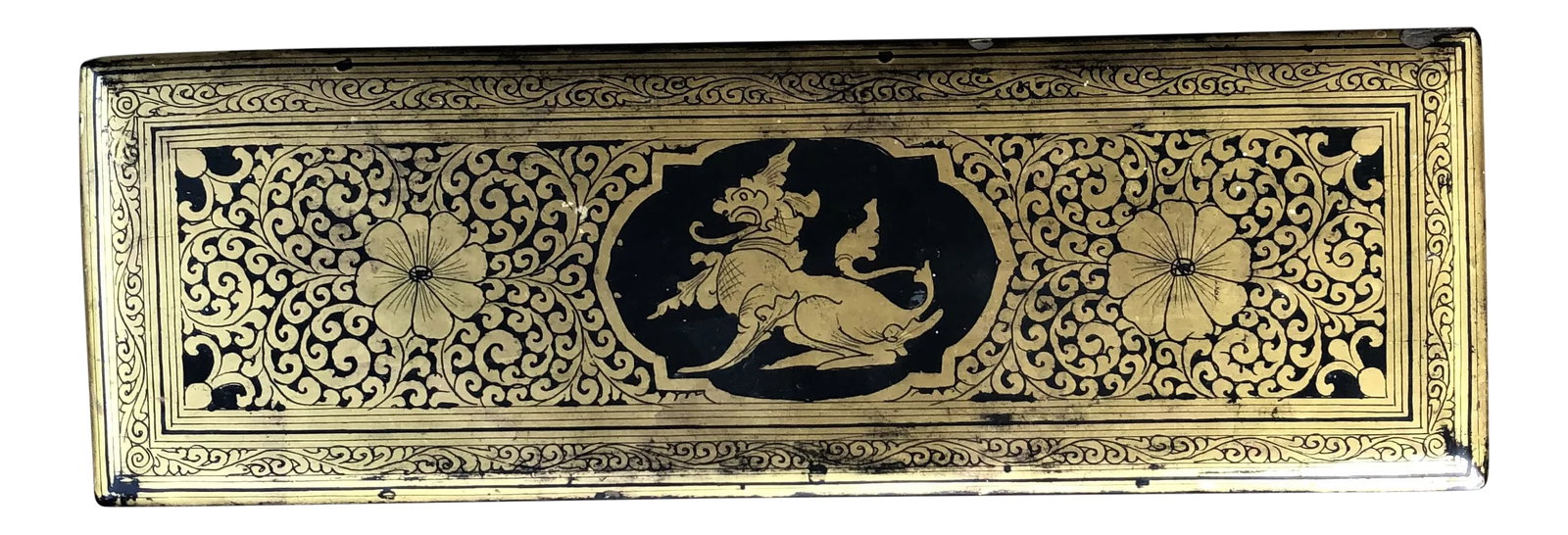 Burmese Vintage Black Lacquer and Gold Long Box: Vintage to antique handmade Burmese black lacquer and gold gilt box to hold scrolls or other items used in a prayer ceremony. A wonderful usable accent piece to your decor. Condition: Alterations: