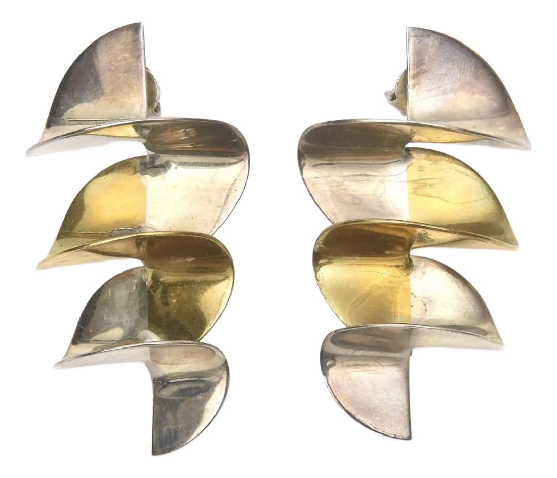 Vintage 2 Tone Brass and Silver Pierced Zig Zag Sculptural Dangle Earrings Pair Of: These vintage 2 tone brass metal and silver metal zig zag dangle sculptural pierced earrings are from the 70's. They are not signed but there is a small mark. Condition: Alterations: Original Conditio