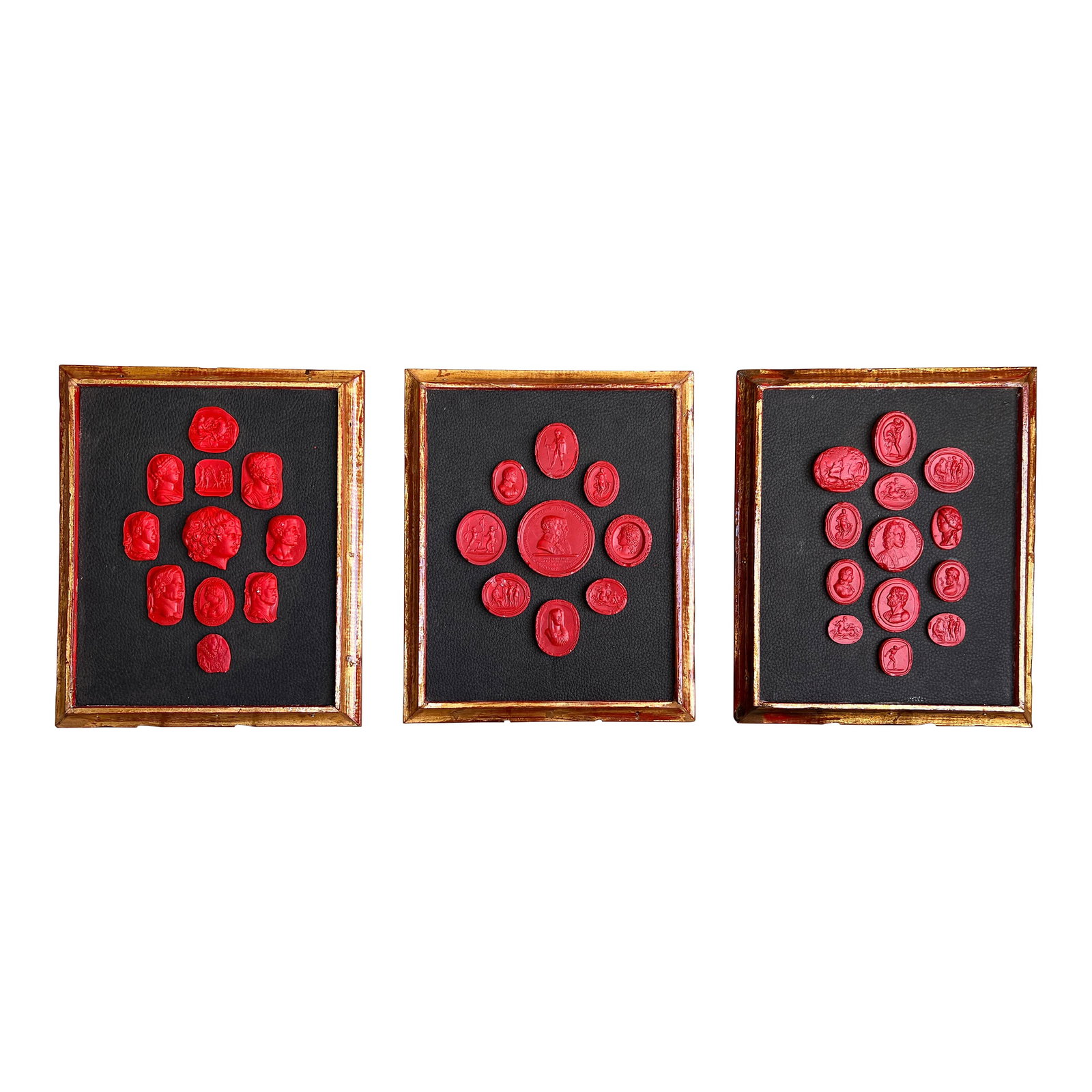 Grand Tour Collection of Gilt Framed Red Plaster Intaglio Casts- Set of 3: Set of three classical dark red stained plaster Grand Tour style cameo and intaglio cast panels.. Each panel with gilt lacquered frame and black leather imitation ground displaying 8-12 highly