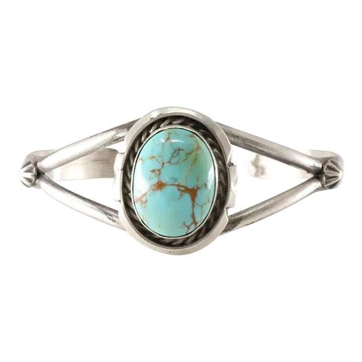 Navajo Sterling Silver Kingman Turquoise Bracelet Cuff by Augustine Largo: Bring home a stunning example of authentic Navajo craftsmanship with this handcrafted bracelet cuff by renowned silversmith Augustine Largo. Featuring a vibrant Kingman turquoise stone set in sterling
