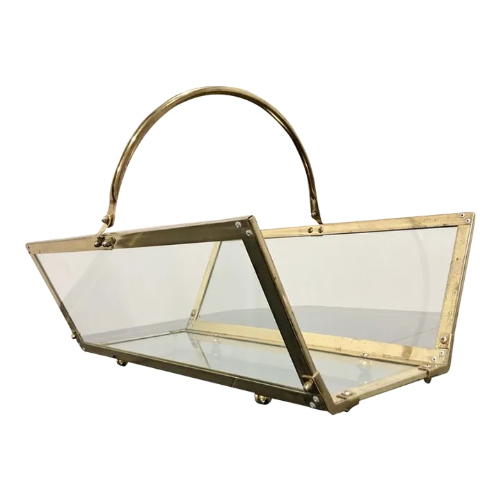 Vintage Brass & Glass Magazine Rack Holder: Large magazine holder from the mid century era. Brass plated frame holding 3 glass panes for the sides and bottom. Elegant, simple and functional DIMENSIONS: Height: 16.5 inches; Width: 20.76 inches;