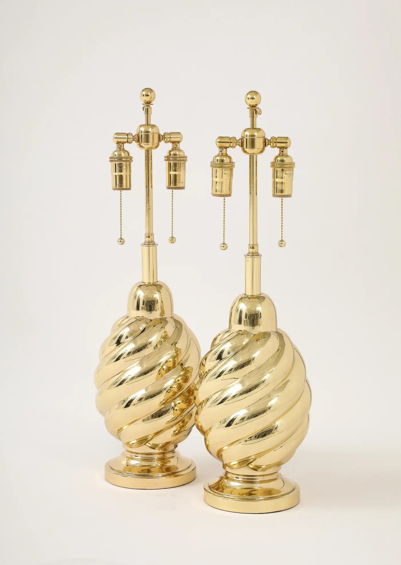 Pair of 1960's Mirror Polished Brass Swirl Lamps by Westwood Industries. - 2