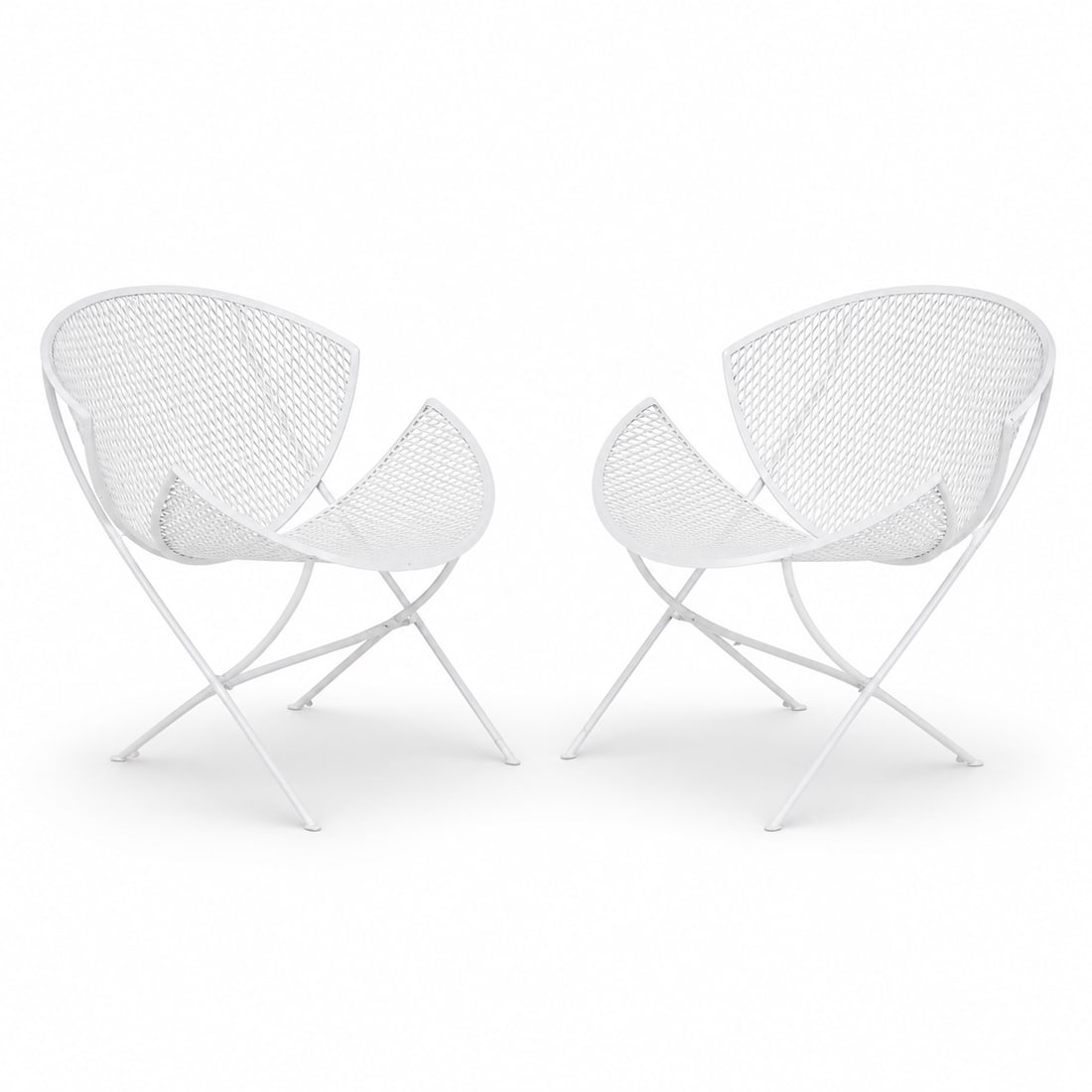 1950s Orange Slice Patio Chairs Maurizio Tempestini for Salterini - a Pair, Attributed: Fabulous pair of vintage 1950s orange slice patio chairs. Made of wrought iron with original white paint, these chairs are in excellent vintage condition. Structurally sound and sturdy. Designed in