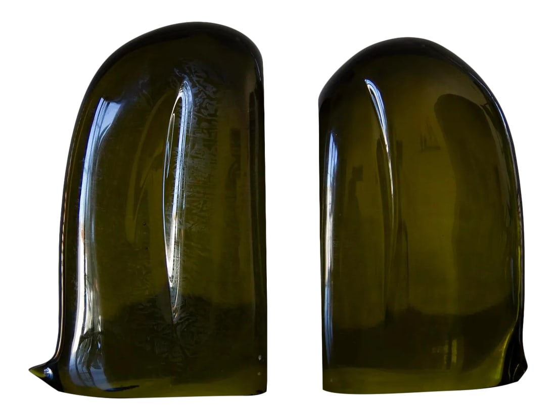 Vintage Mid-Century Modern Murano Amber Green Glass Bookends - a Pair: Beautiful vintage Murano hand blown green amber Italian art glass bookend sculptures. Can be used by it s own or as a pair to keep your favorite books in place, or as an art contemporary piece for