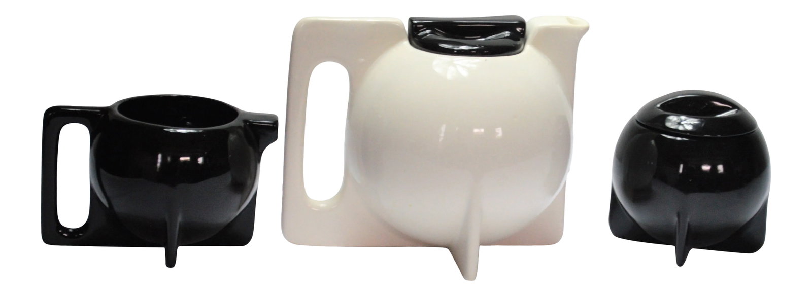 1980s Bauhaus Memphis-Style Pottery Tea Pot, Creamer, & Sugar Jar- 3 Pieces: Manner of Bauhaus Memphis Style coffee and tea service set unsigned and contains no hallmark. White pot w/black lid, black sugar and creamer. The set is used in excellent condition, however, it may
