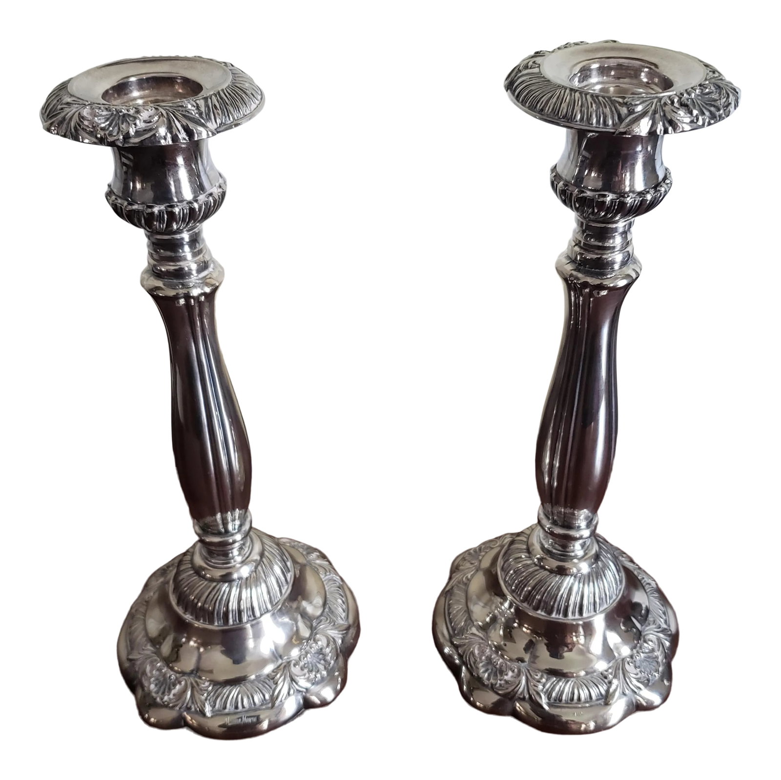 1960s Vintage Neiman Marcus Italian Silver-Tone Metal Candle Holders- a Pair: 1960s Pair of heavy silver-tone metal candle holders made in Italy and by Neiman Marcus. Measurements are 4.5" in diameter and 10.5" tall. Brighten your household with these lustrous silver candlestic