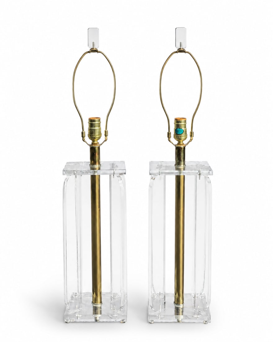 Vintage Lucite and Brass Table Lamps - a Pair: Beautiful pair of vintage lucite and brass table lamps. Very elegant shape and style, with the iconic mid-century modern feel. Lucite and brass in excellent condition. 30 H 6 W/D Condition: